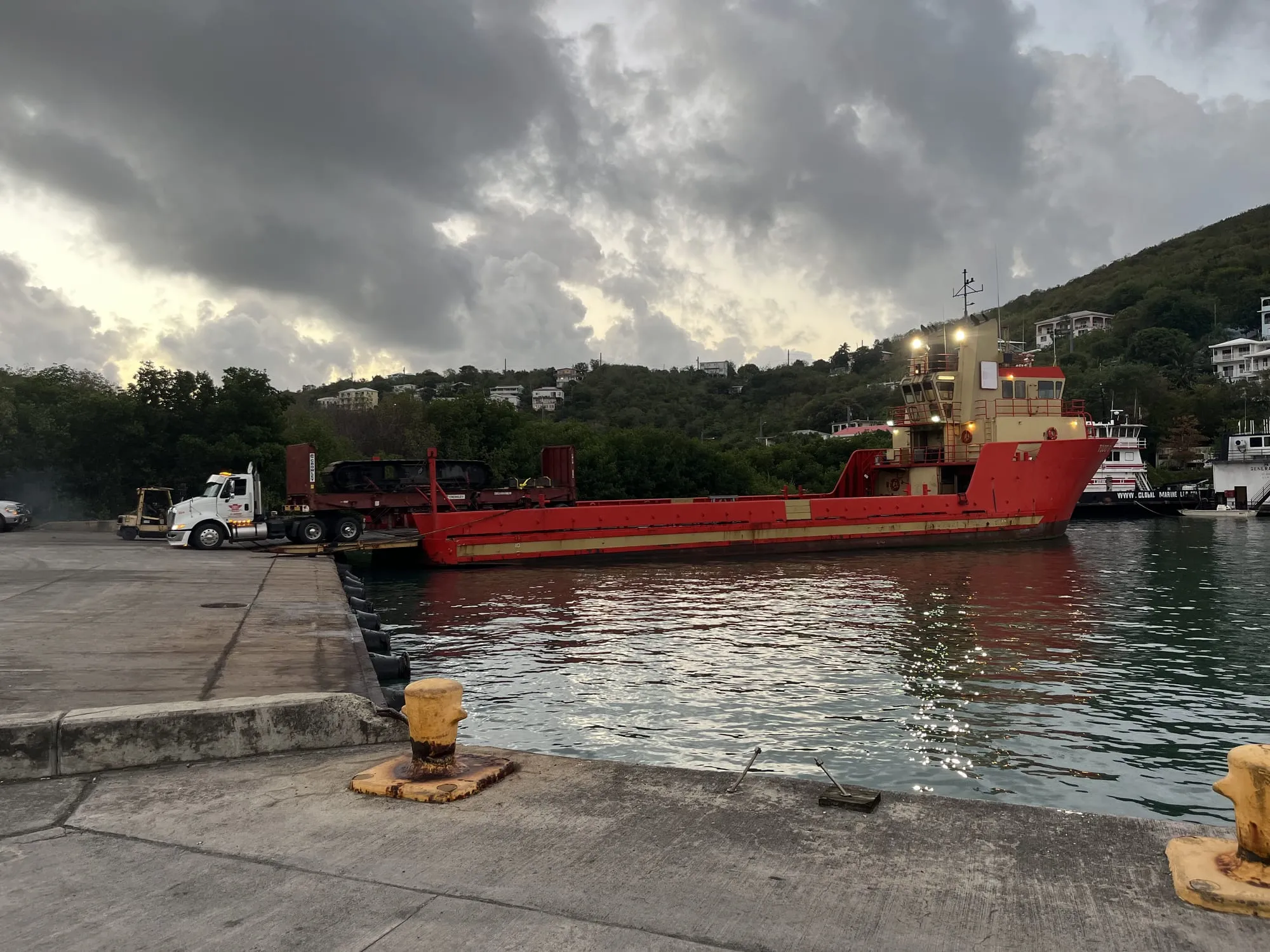 A landing craft tied up at the dock, the route every load to the island takes
