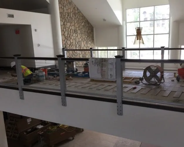 The check-in building under renovation, materials laid out along the walkway