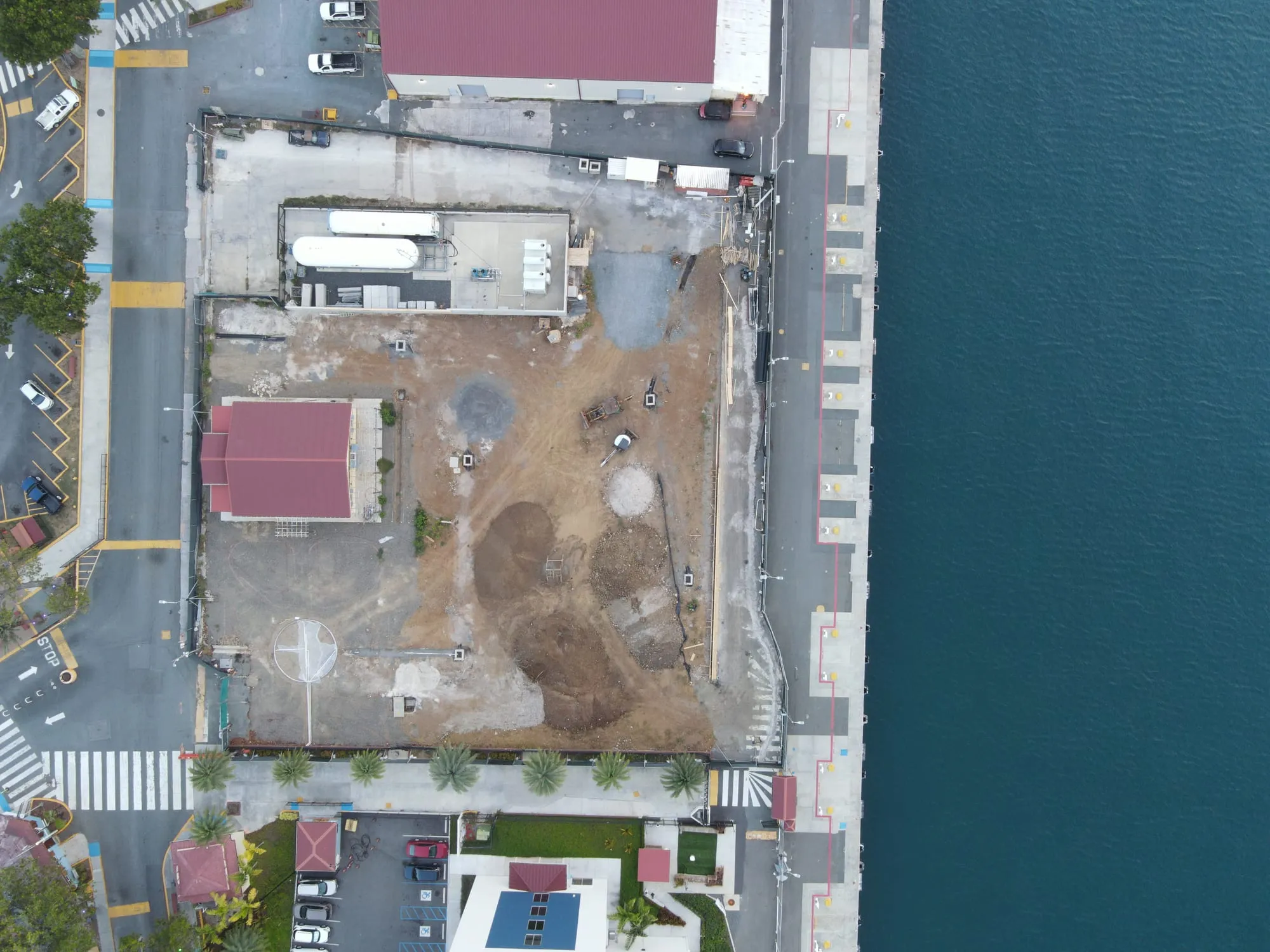 Aerial view of the completed plaza and planting between the hotel and the harbour