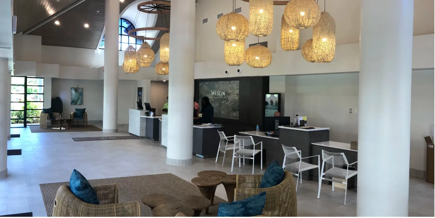 Resort lobby Resort lobby with reception desks and woven pendant lighting