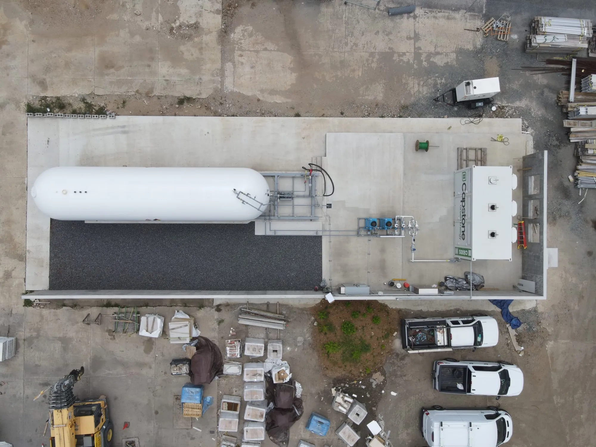 Aerial view of the hotel's on-site power plant, with its LPG storage tank and equipment pads